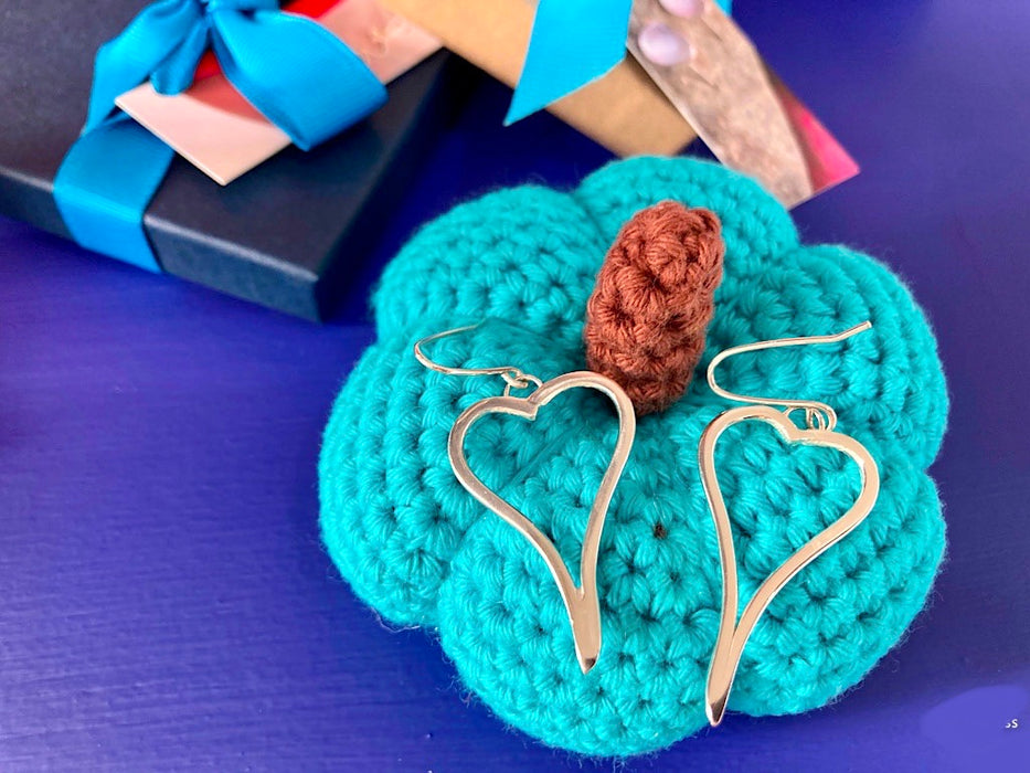 Asymmetric heart earrings