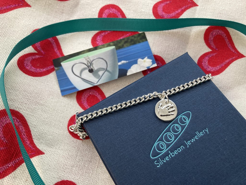Silver handprint charm bracelet