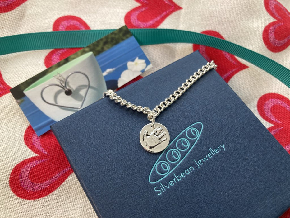 Silver handprint charm bracelet