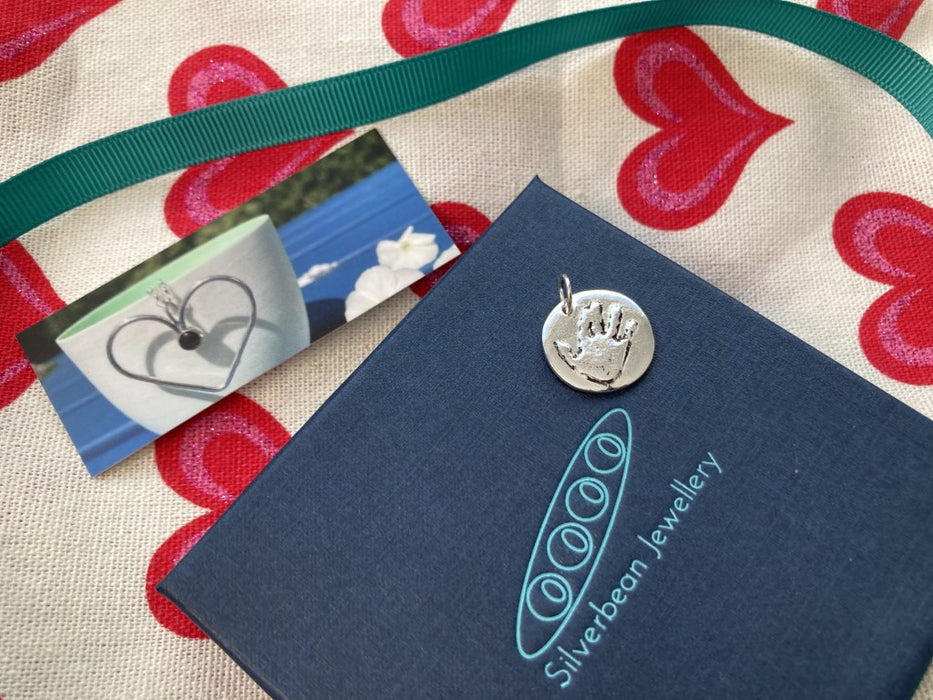 Silver handprint charm bracelet