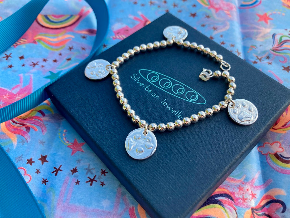 Silver handprint voucher