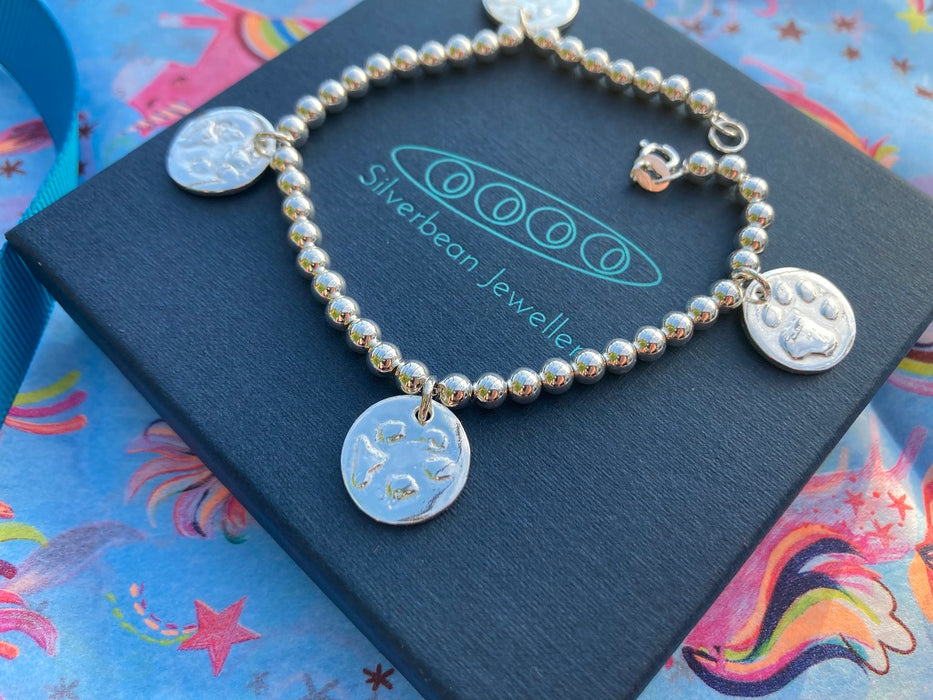 Silver handprint voucher