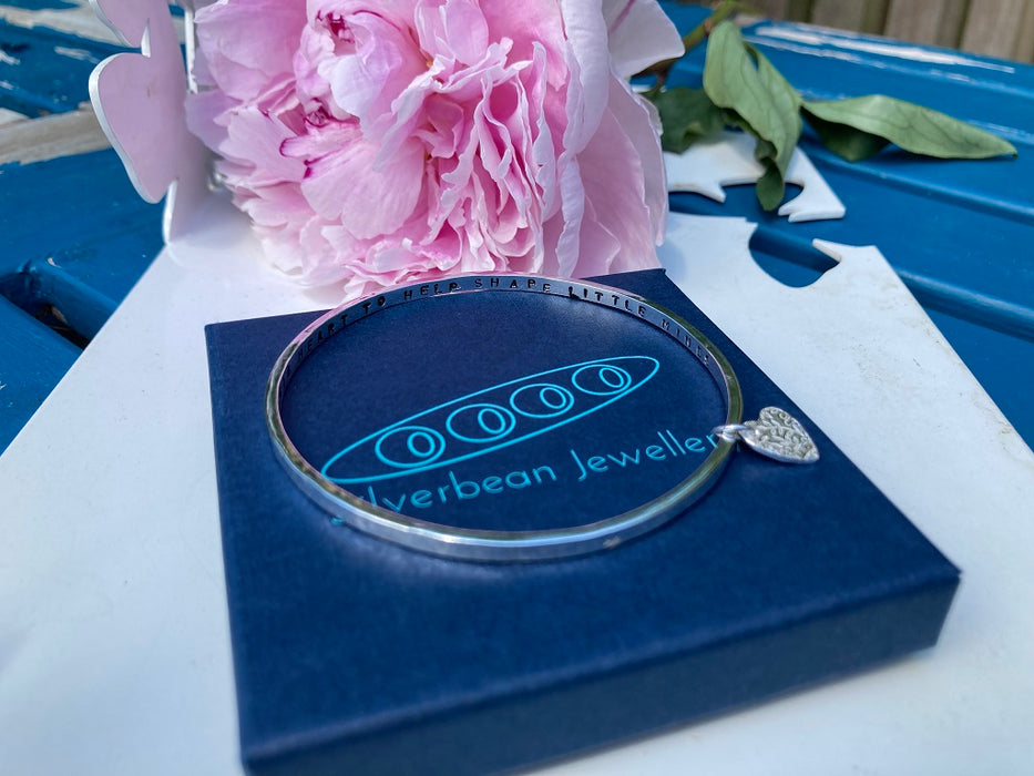 Personalised silver hammered bangle