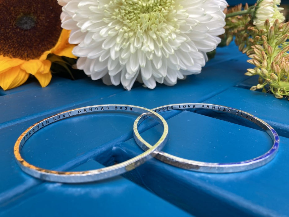 Personalised silver hammered bangle