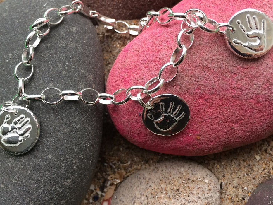 Silver handprint charm bracelet