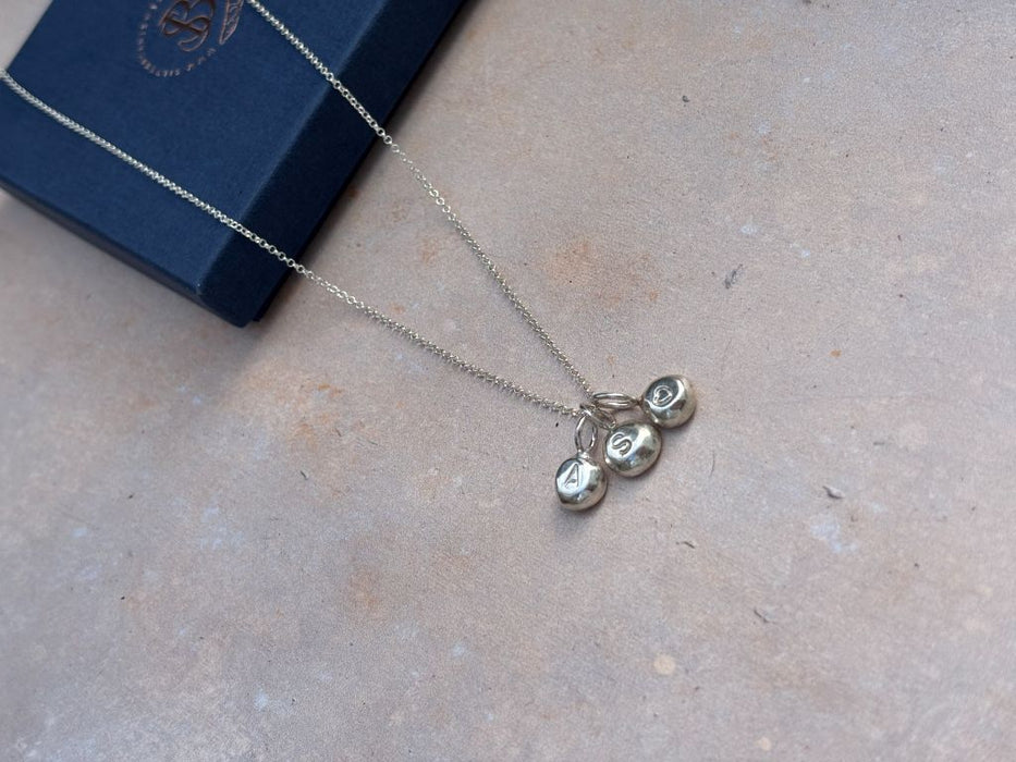 Silver strength nugget necklace