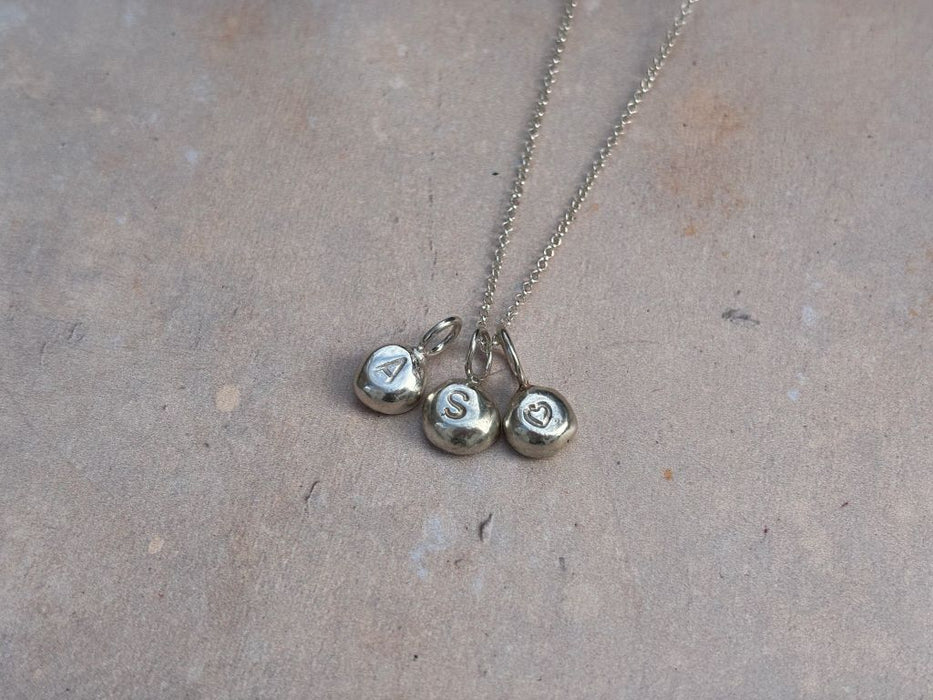 Silver strength nugget necklace