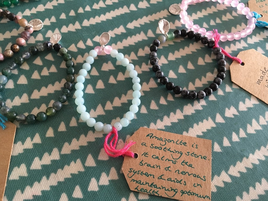 Yoga beaded bracelet with silver shell charm