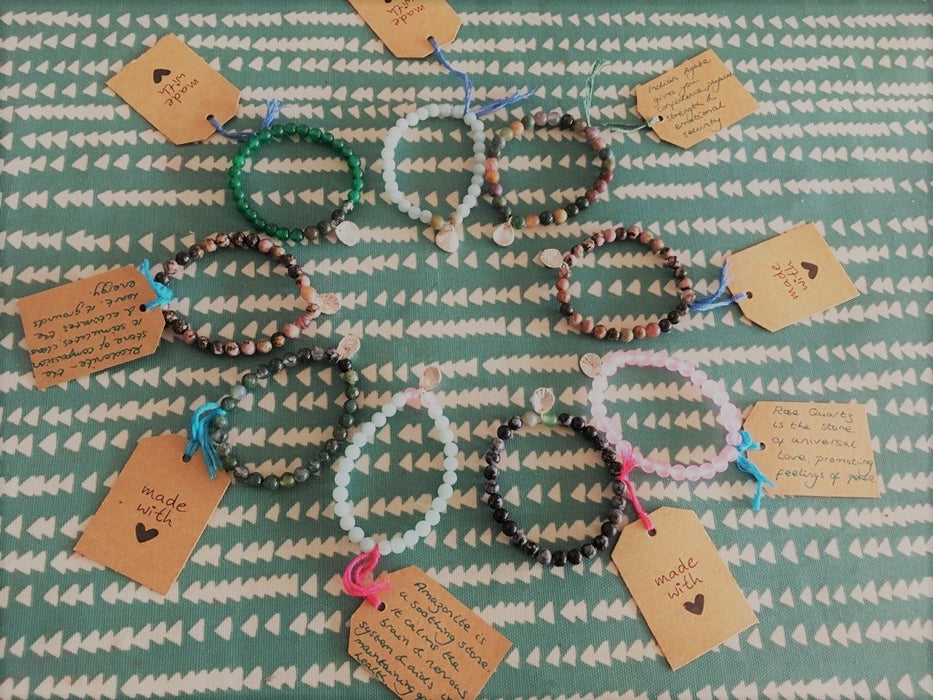 Yoga beaded bracelet with silver shell charm